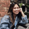 Maivy Tran facing camera with hand on face